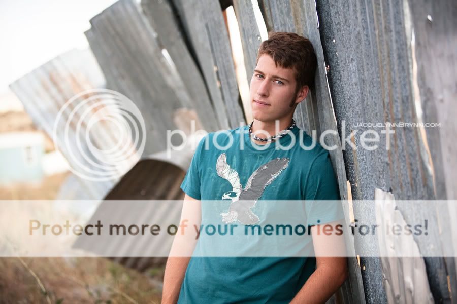 senior,boy,portrait,photo,chelan,wa,jacquelynn brynn photography,industrial,metal,grundge,american eagle,washington,wenatchee